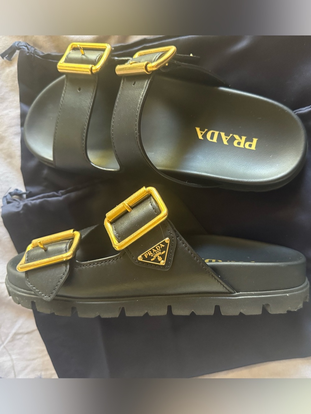 Prada Black Leather Slide Sandals with Gold Buckles